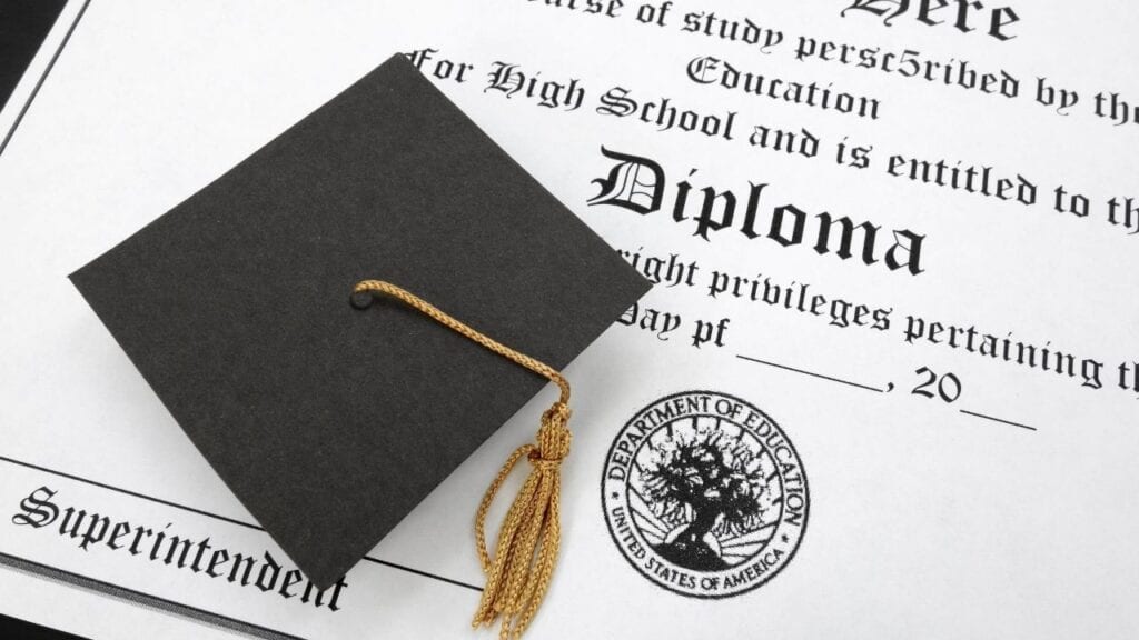 closeup of a high school diploma with a tassel