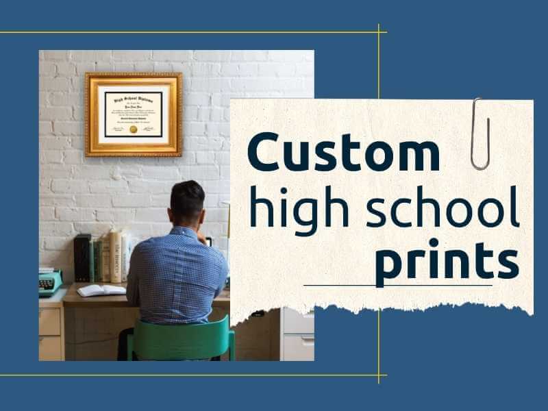 guy sitting at desk with high school diploma in shiny gold frame hung on wall in front of him